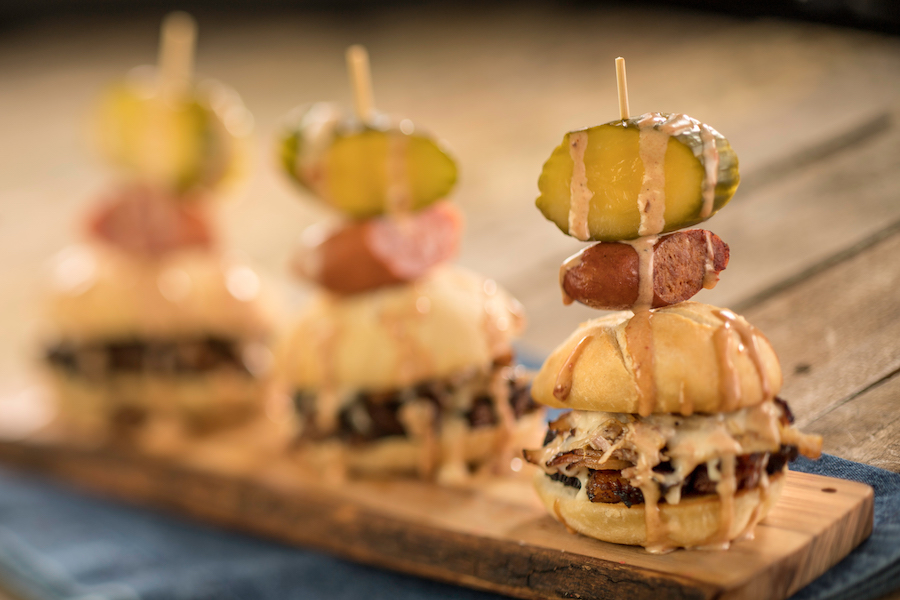 Beef Brisket Burnt Ends and Smoked Pork Belly Slider with Garlic Sausage, Chorizo, Cheddar Fondue, and House-made Pickle
